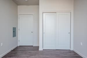 Bedroom with sliding closet doors at 459 Rock Apartments, 459 SE 192nd Ave, Gresham, Oregon 97233