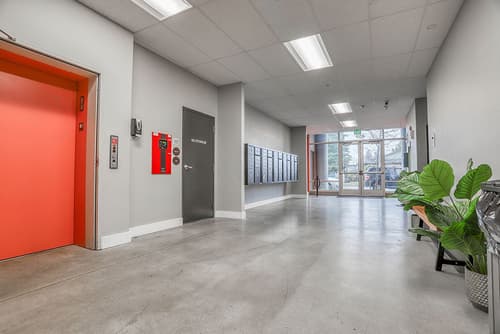 Lobby with accent wall at 459 Rock Apartments