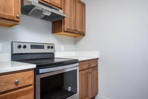 Kitchen with stainless steel stove at 459 Rock Apartments, 459 SE 192nd Ave, Gresham, Oregon 97233