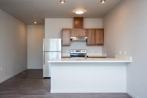 Kitchen with stainless steel appliances and recessed lighting at 459 Rock Apartments, 459 SE 192nd Ave, Gresham, Oregon 97233