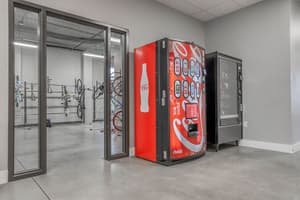 Bike storage area with vending machines at 459 Rock Apartments, 459 SE 192nd Ave, Gresham, Oregon 97233