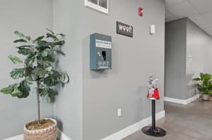 Hallway with indoor plants, dog station at 459 Rock Apartments, 459 SE 192nd Ave, Gresham, Oregon 97233