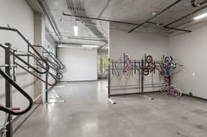 Storage with bike racks, concrete floor at 459 Rock Apartments, 459 SE 192nd Ave, Gresham, Oregon 97233