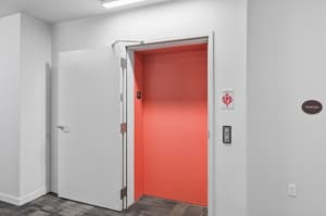 Hallway with elevator access, carpeted floor at 459 Rock Apartments, 459 SE 192nd Ave, Gresham, Oregon 97233