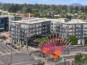 Aerial with modern apartment complex, balconies at 459 Rock Apartments, 459 SE 192nd Ave, Gresham, Oregon 97233