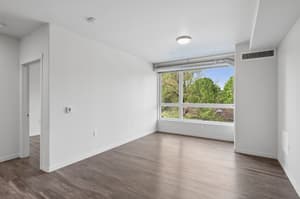 Living Room with large window, hardwood floors at 459 Rock Apartments, 459 SE 192nd Ave, Gresham, Oregon 97233