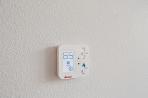 Hallway with thermostat, textured wall at 459 Rock Apartments, 459 SE 192nd Ave, Gresham, Oregon 97233
