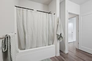 Bathroom with bathtub shower combo, towel rack at 459 Rock Apartments, 459 SE 192nd Ave, Gresham, Oregon 97233