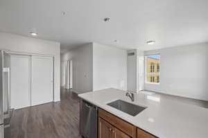 Kitchen with stainless steel appliances, hardwood floors at 459 Rock Apartments, 459 SE 192nd Ave, Gresham, Oregon 97233