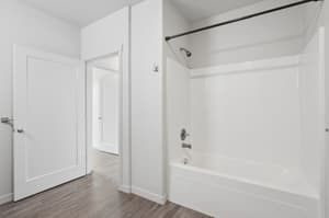 Bathroom with bathtub shower combo, white walls at 459 Rock Apartments, 459 SE 192nd Ave, Gresham, Oregon 97233