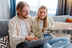Person browsing available apartments on a laptop